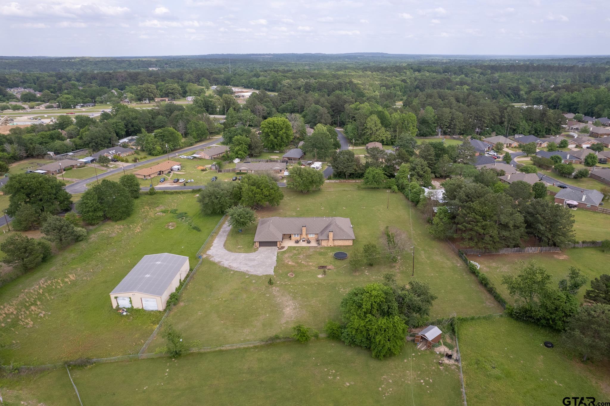 2201 Ridgley Tyler, TX 75703 - Photo 41 of 42 an aerial view of a houses with a lake view
