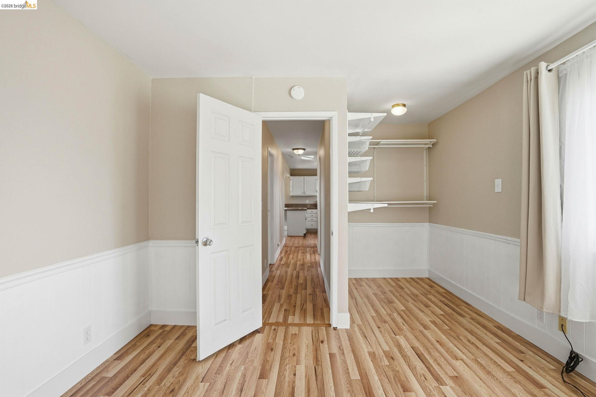 840 Key Rte Boulevard Albany, CA 94706 - Photo 32 of 42 a view of hallway with wooden floor
