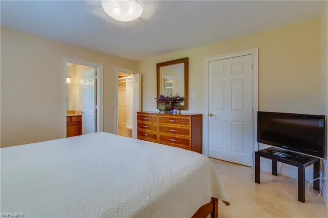 a bedroom with a bed and furniture