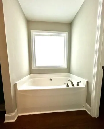 a bathroom with a bathtub
