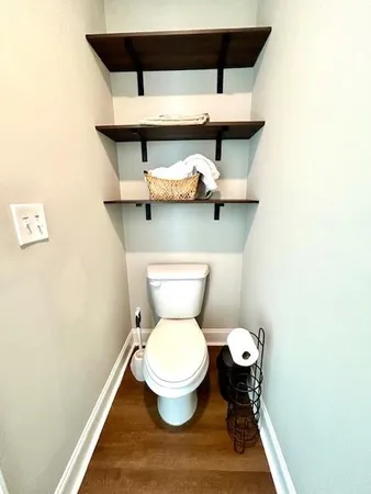 a bathroom with a toilet and a sink