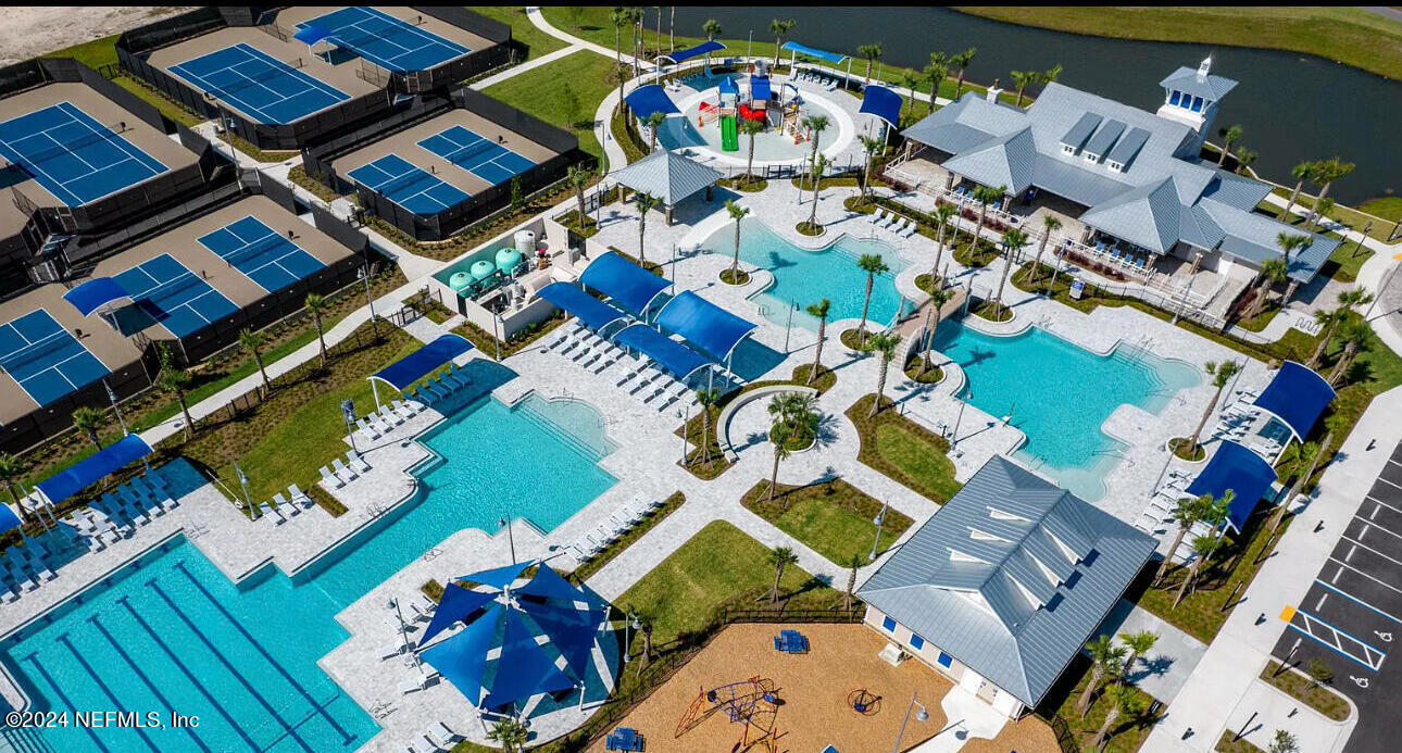 173 Wood Breeze Way St. Augustine, FL 32092 - Photo 13 of 36 an aerial view of a house a swimming pool outdoor seating and outdoor seating