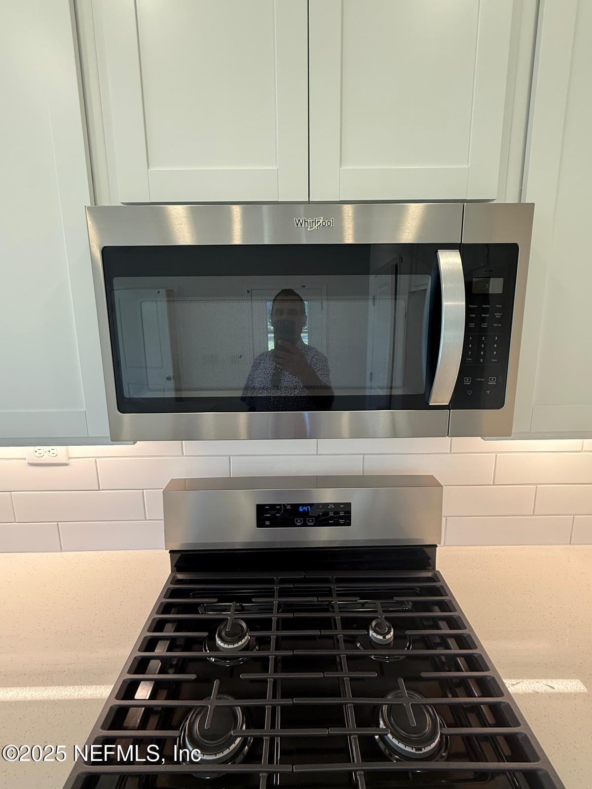 173 Wood Breeze Way St. Augustine, FL 32092 - Photo 33 of 36 a close view of stove