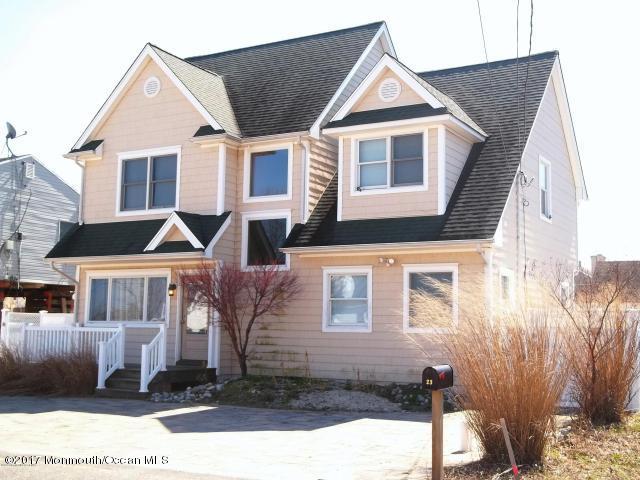 23 Point Road Toms River, NJ 08753 - Photo 3 of 14 a front view of a house with a yard