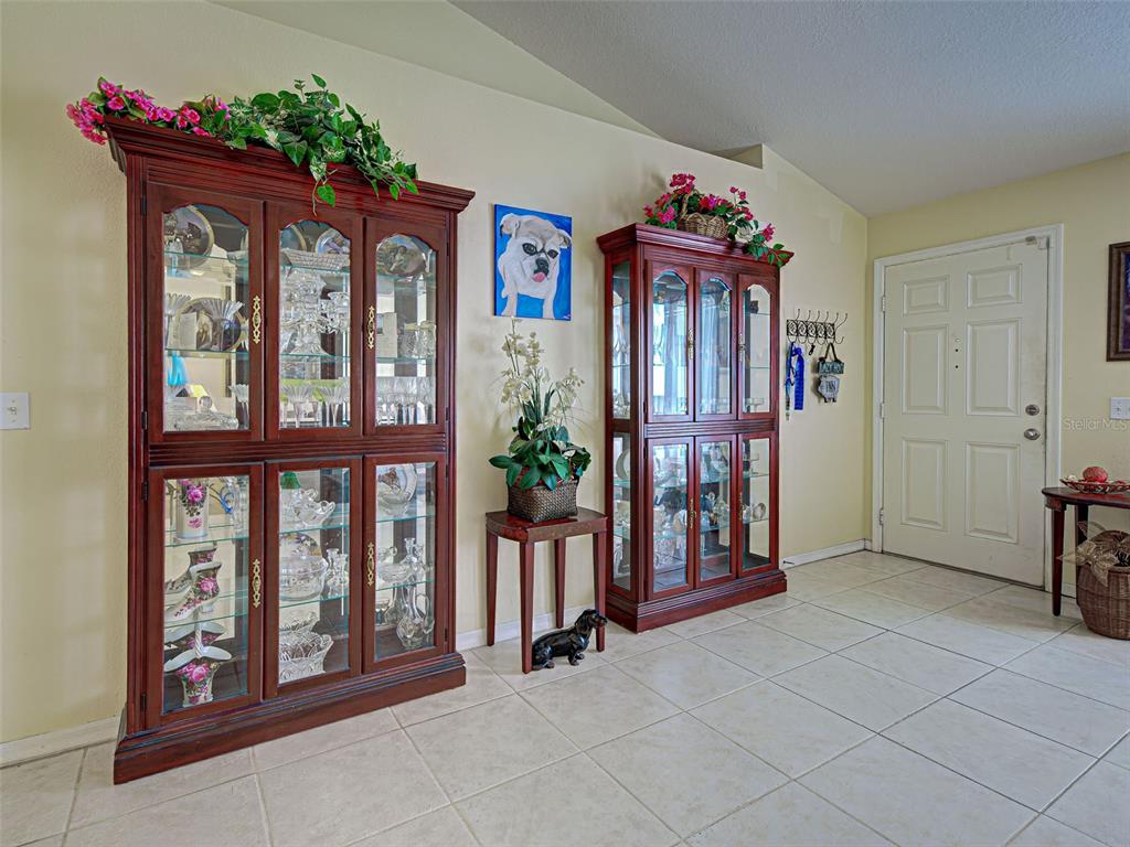 3139 Point Street North Port, FL 34286 - Photo 14 of 58 a front view of a house with entryway