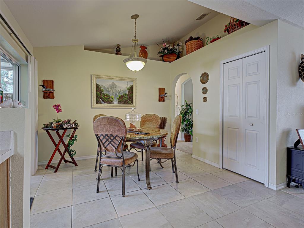 3139 Point Street North Port, FL 34286 - Photo 27 of 58 a view of a dining room with furniture
