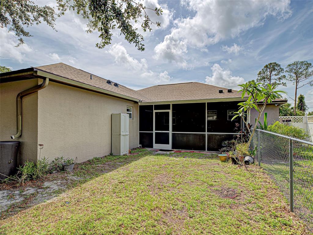 3139 Point Street North Port, FL 34286 - Photo 58 of 58 a view of a house with a yard and sitting area