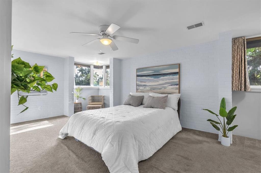 136 Fairfax Road Pittsburgh, PA 15221 - Photo 18 of 50 a bedroom with a bed and ceiling fan