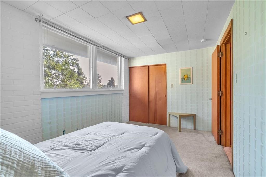 136 Fairfax Road Pittsburgh, PA 15221 - Photo 25 of 50 a bedroom with a bed and a window