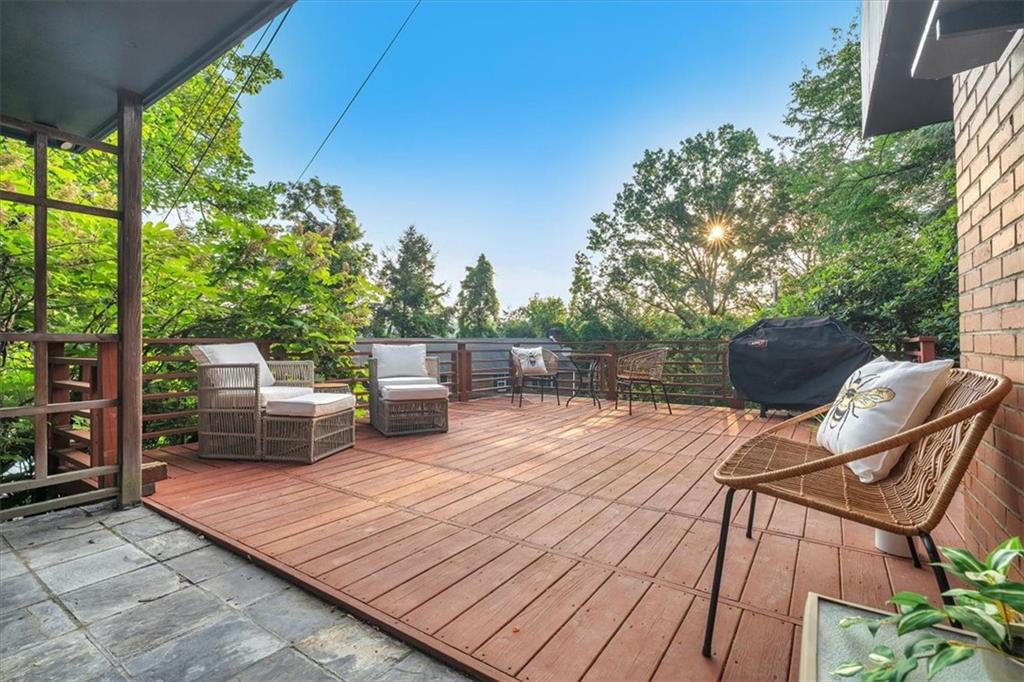 136 Fairfax Road Pittsburgh, PA 15221 - Photo 29 of 50 a view of a wooden deck with furniture