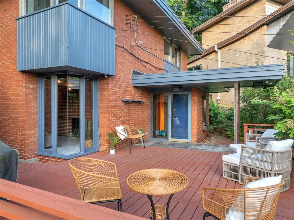 136 Fairfax Road Pittsburgh, PA 15221 - Photo 41 of 50 a patio with a table and chairs