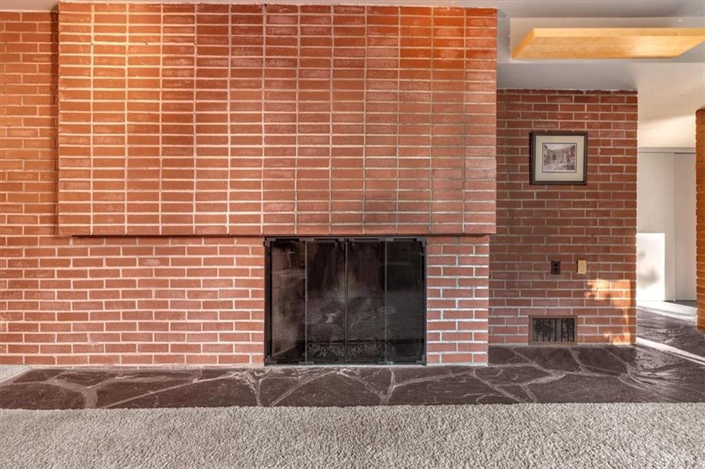 136 Fairfax Road Pittsburgh, PA 15221 - Photo 7 of 50 a brick oven with a door