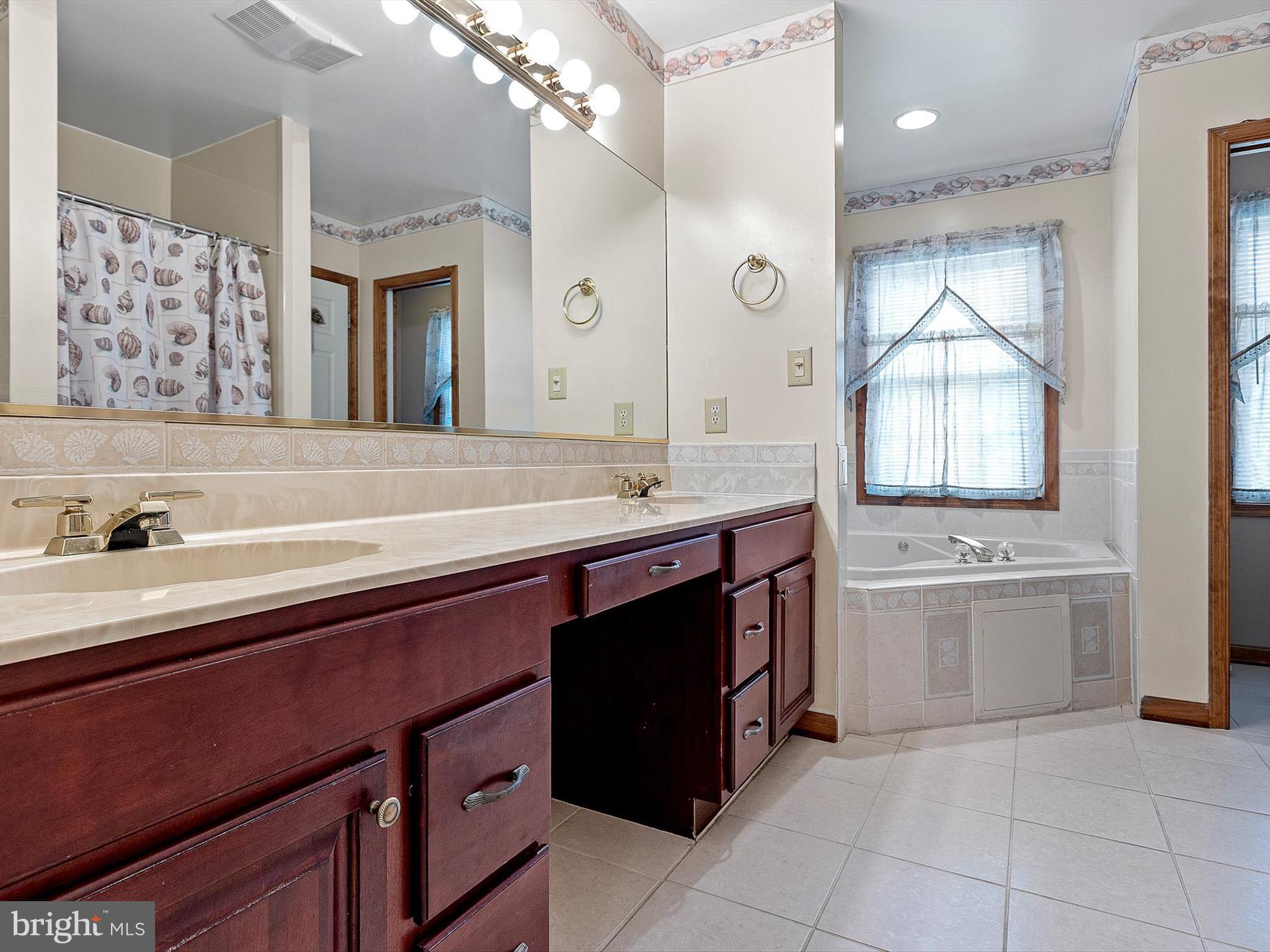 616 Bethany Loop Bethany Beach, DE 19930 - Photo 17 of 57 Owner's ensuite bath with separate tub and shower