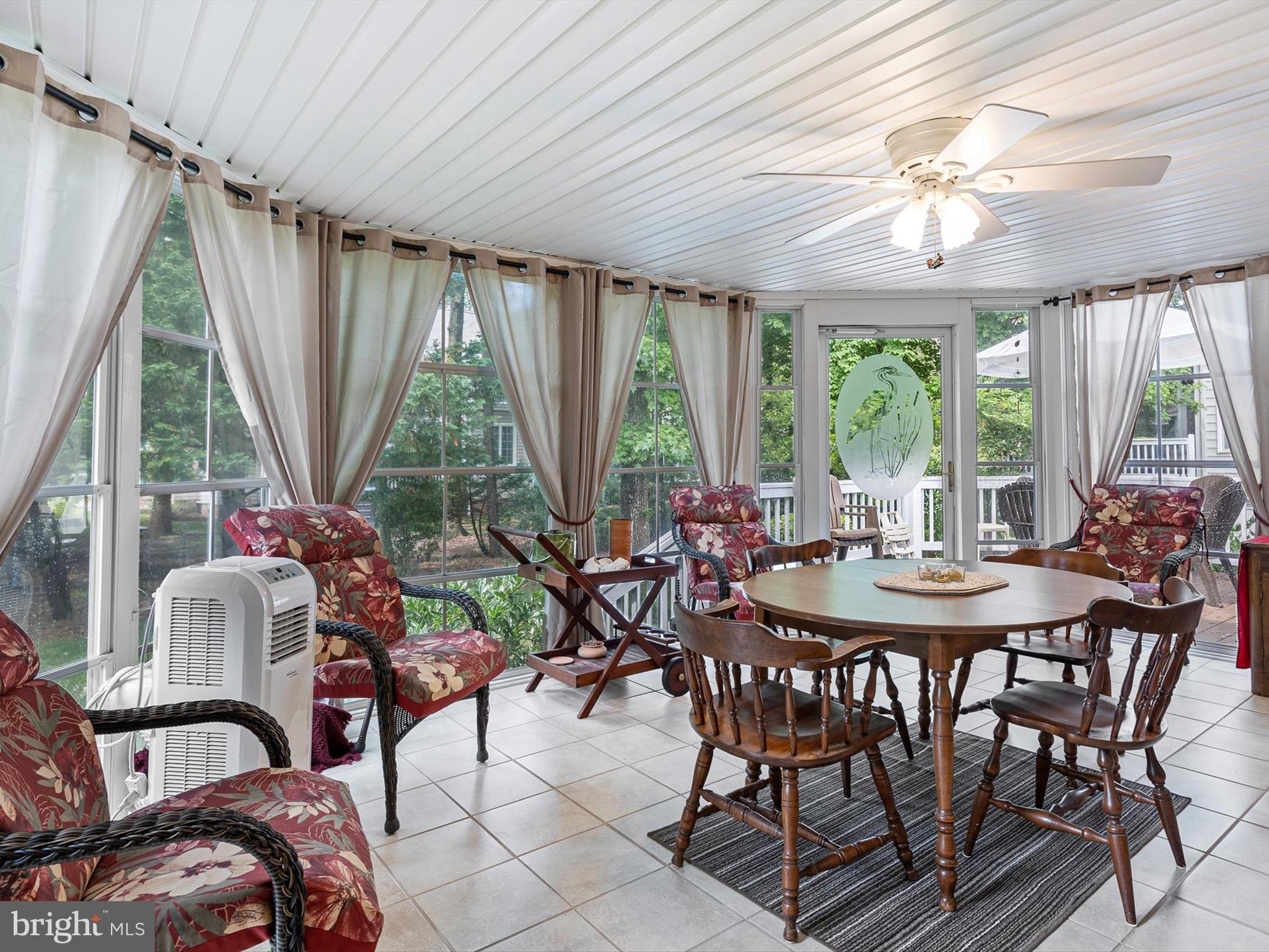 616 Bethany Loop Bethany Beach, DE 19930 - Photo 26 of 57 Enclosed 3-season room with free-standing A/C unit