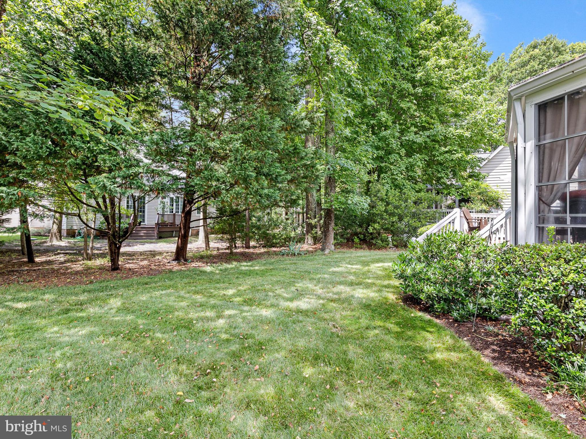 616 Bethany Loop Bethany Beach, DE 19930 - Photo 30 of 57 Landscaped yard
