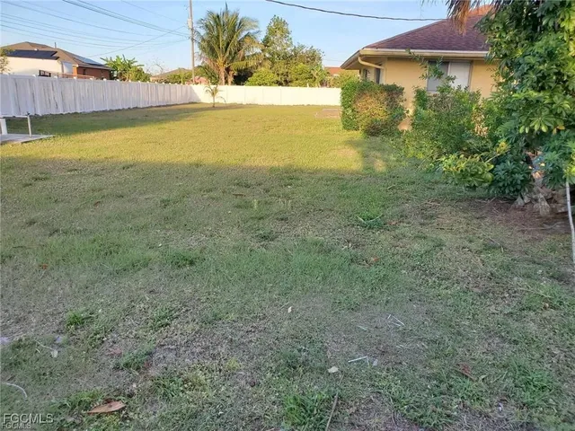a view of an ocean and a yard