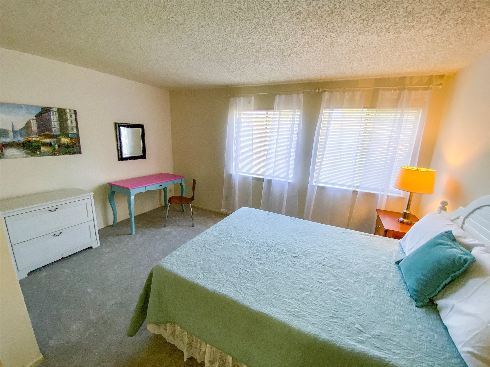 12905 Pegasus Street Austin, TX 78727 - Photo 20 of 32 a bedroom with a bed and a window