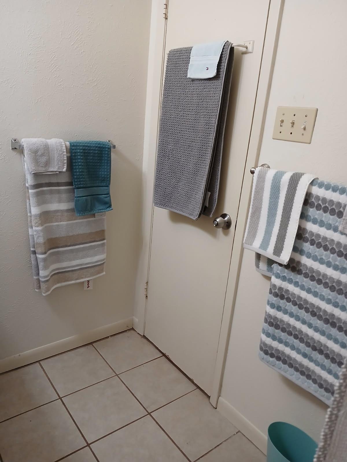 12905 Pegasus Street Austin, TX 78727 - Photo 22 of 32 a view of walk in closet with clothes and shoes