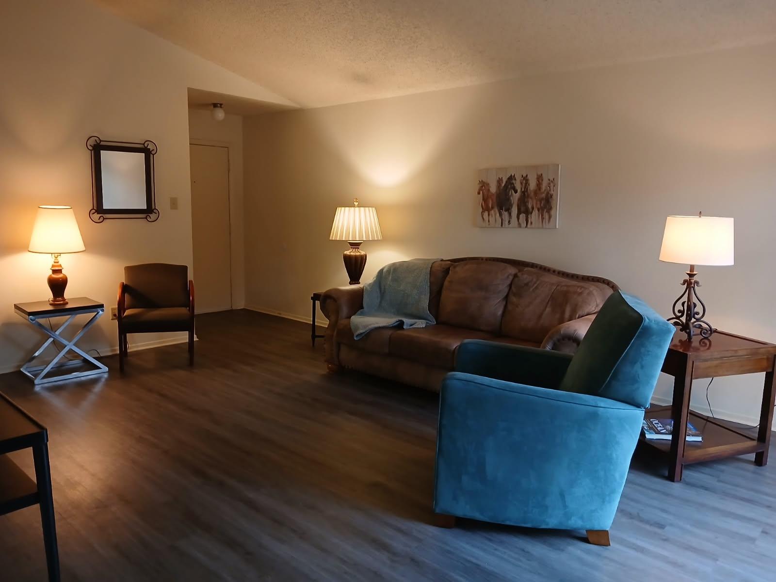 12905 Pegasus Street Austin, TX 78727 - Photo 8 of 32 a living room with furniture and a wooden floor