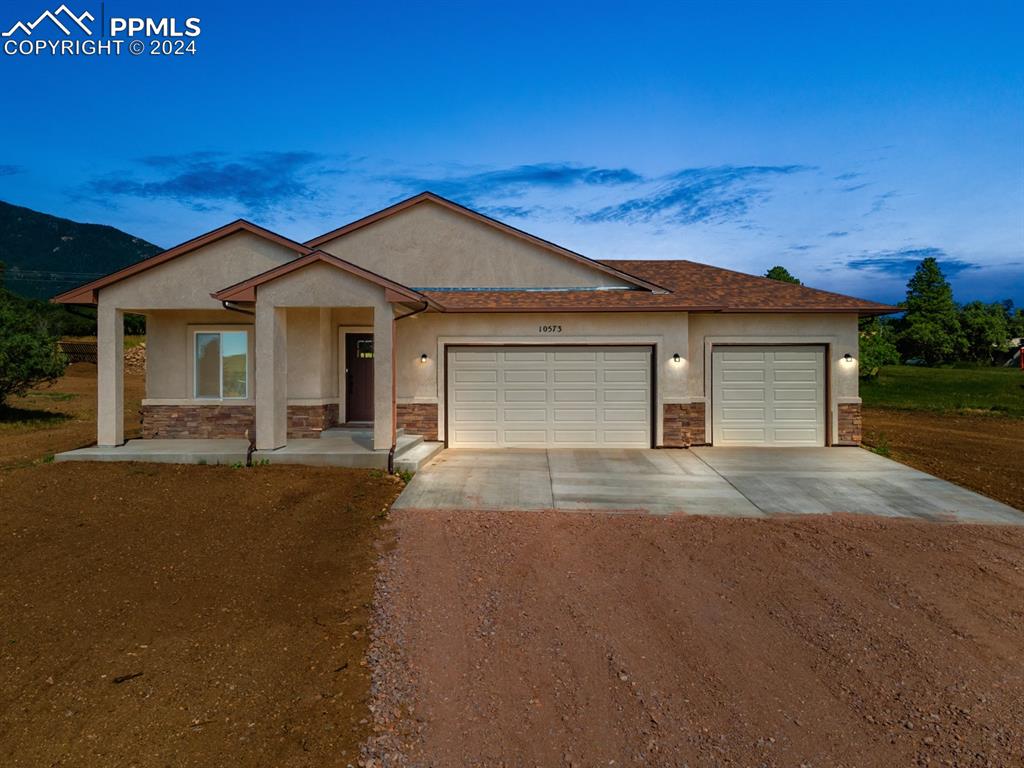 front view of a house with a street