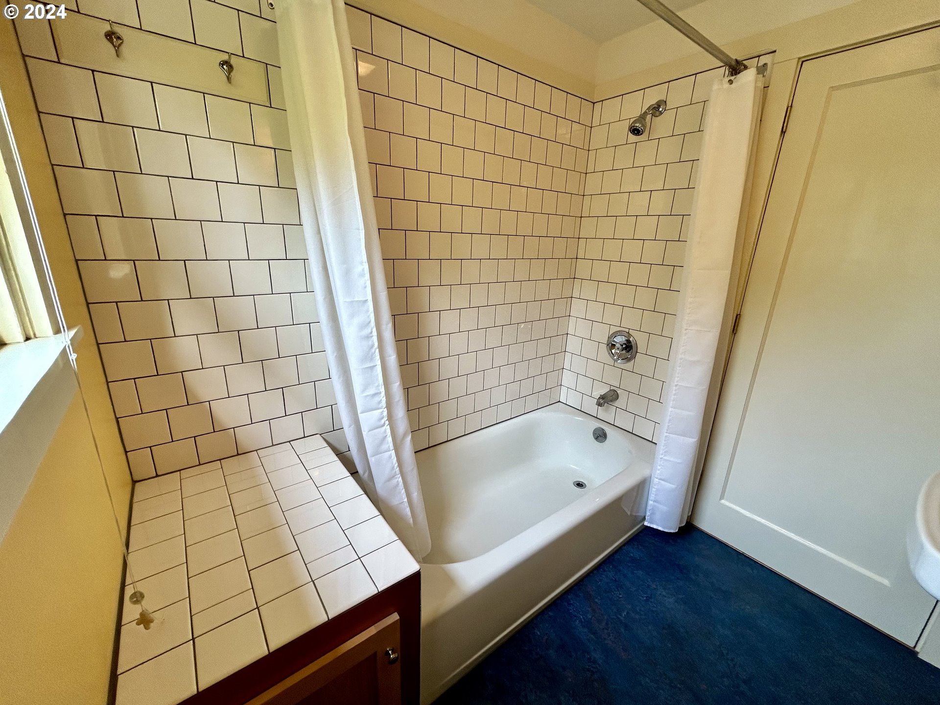 329 5th Street Springfield, OR 97477 - Photo 22 of 35 a bathroom with a bathtub and shower