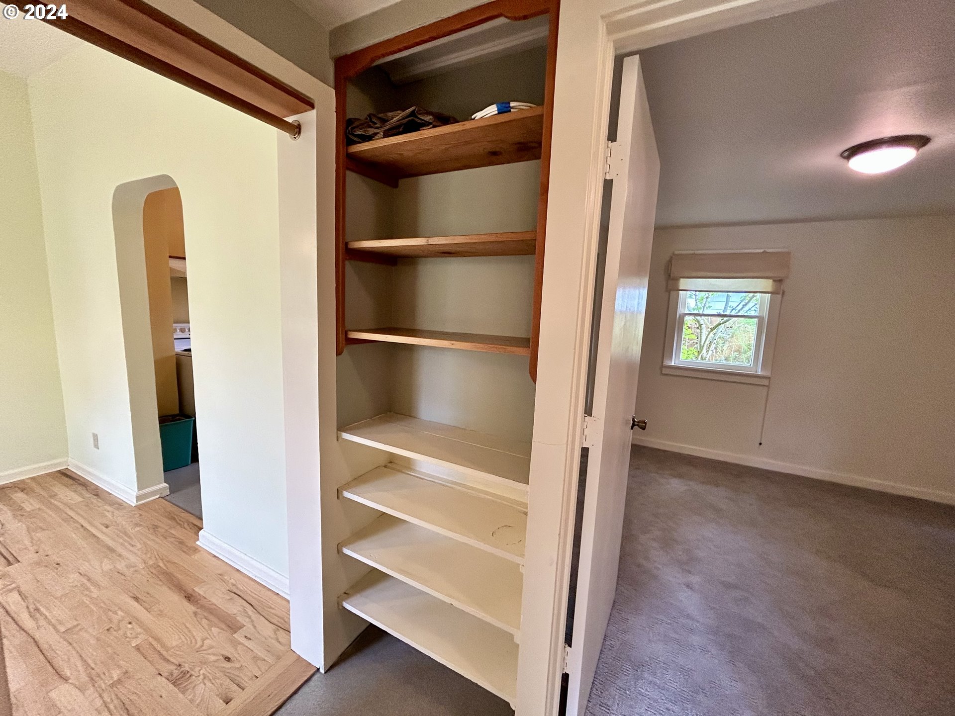 329 5th Street Springfield, OR 97477 - Photo 23 of 35 a view of walk in closet with empty racks
