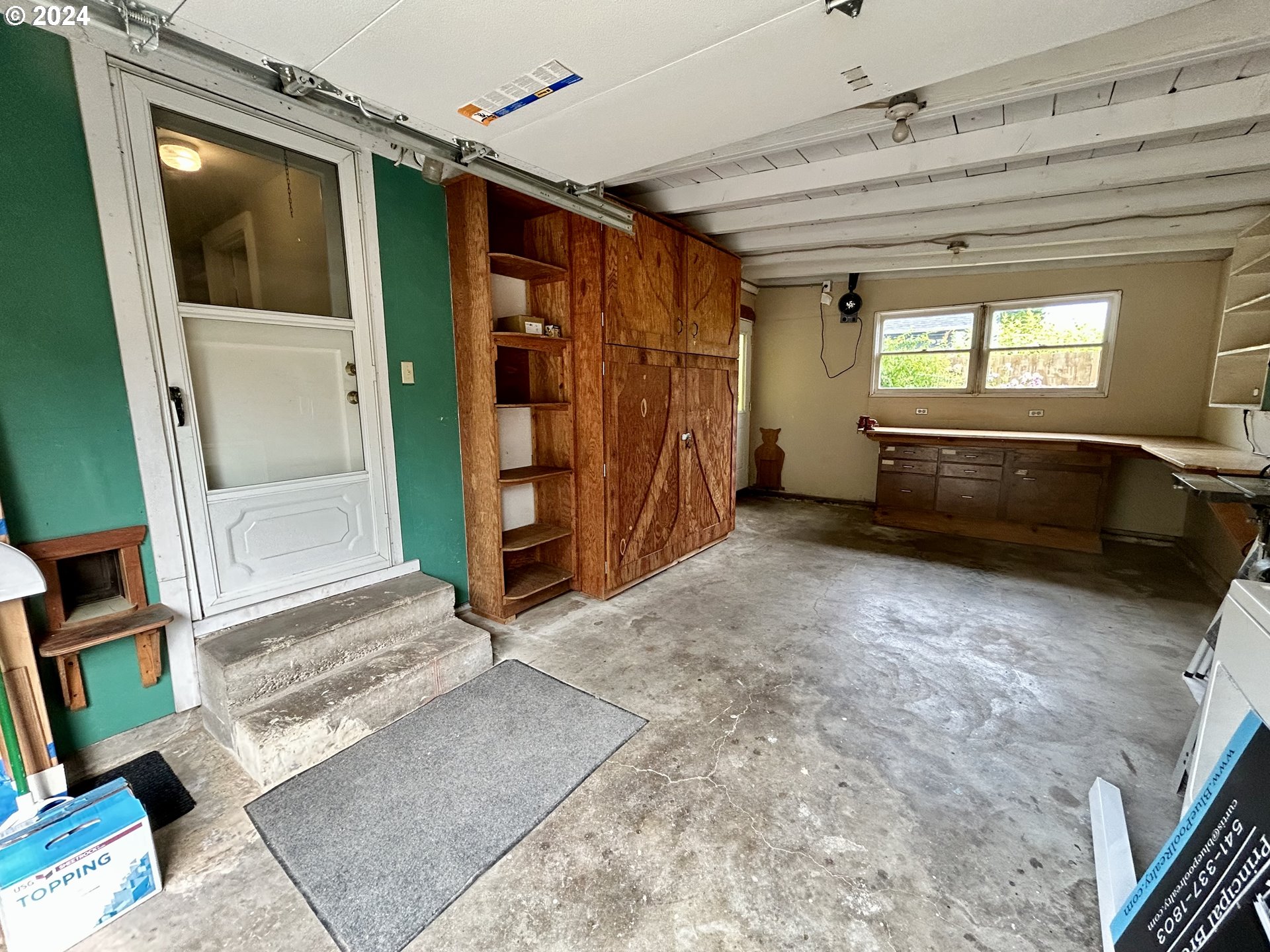 329 5th Street Springfield, OR 97477 - Photo 27 of 35 a view of an empty room and a window