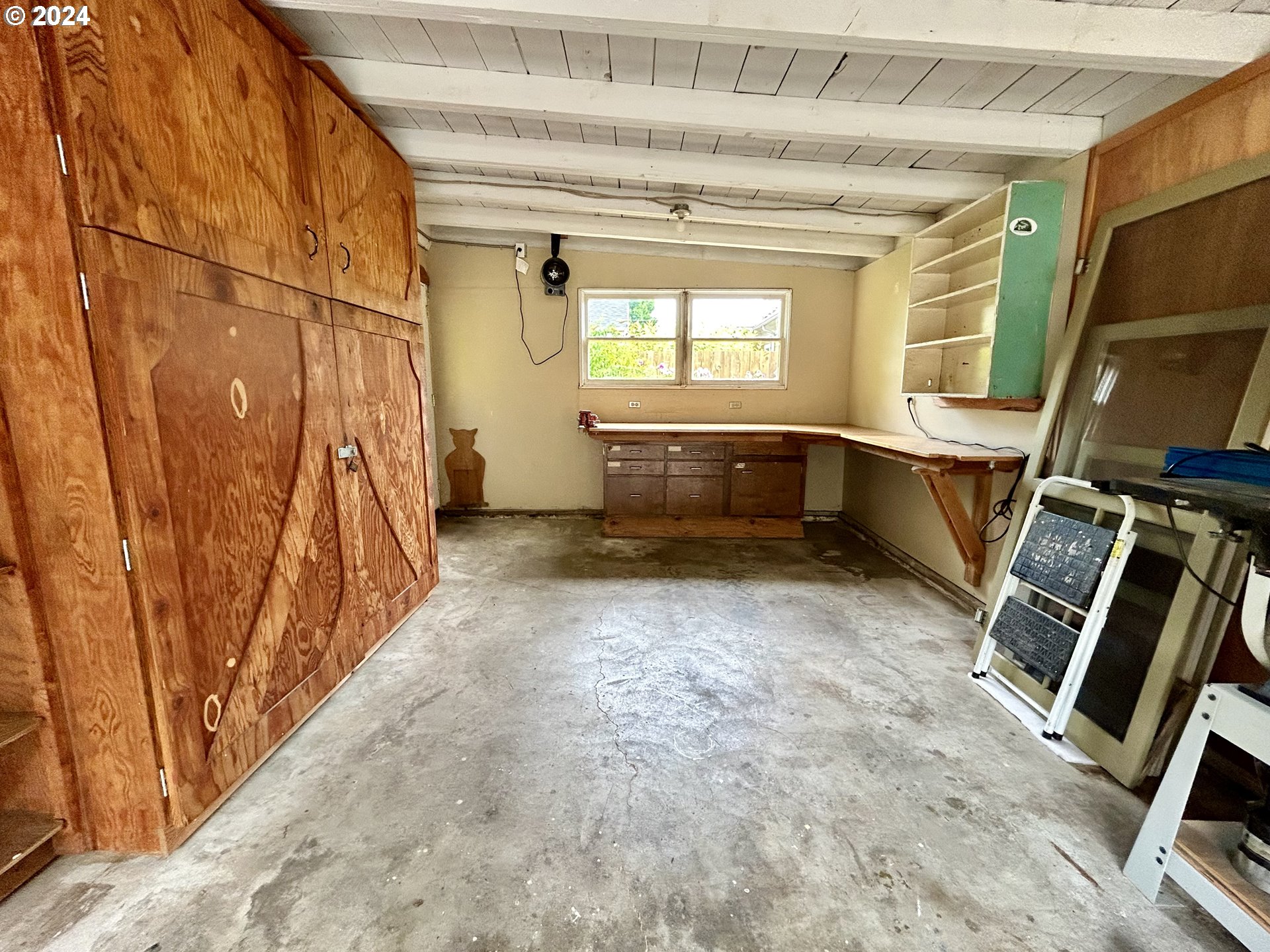 329 5th Street Springfield, OR 97477 - Photo 28 of 35 a view of an empty room with a window