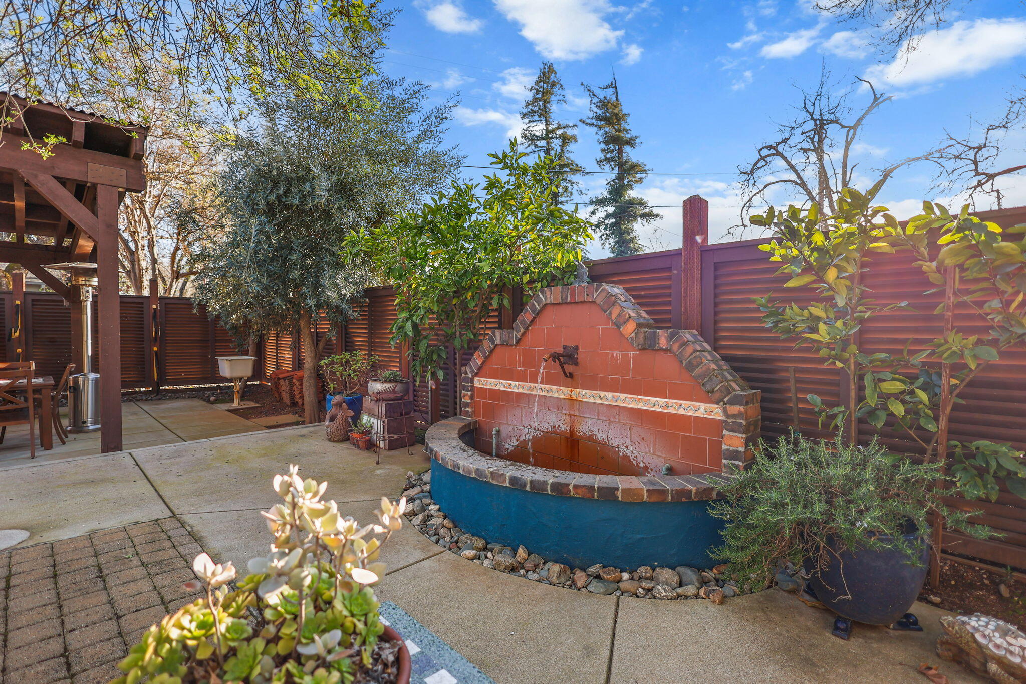 1465 Riverside Drive Redding, CA 96001 - Photo 44 of 163 Charming Fountain in Backyard