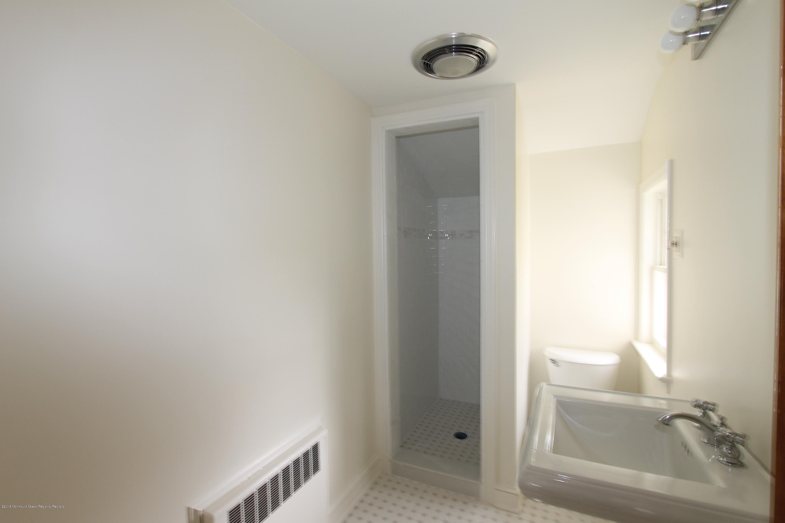 484 Hance Road Little Silver, NJ 07739 - Photo 17 of 22 a bathroom with a bathtub and a sink