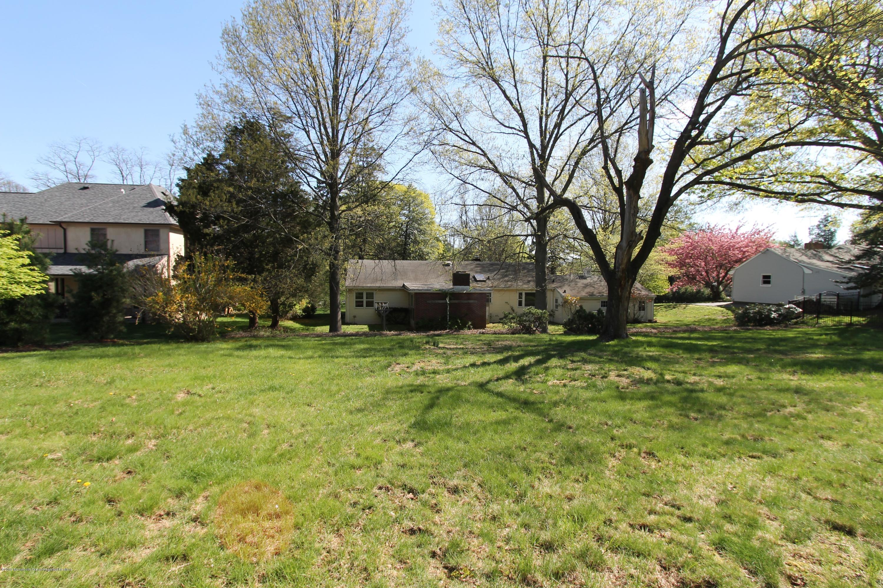 484 Hance Road Little Silver, NJ 07739 - Photo 21 of 22 a backyard of a house with lots of green space