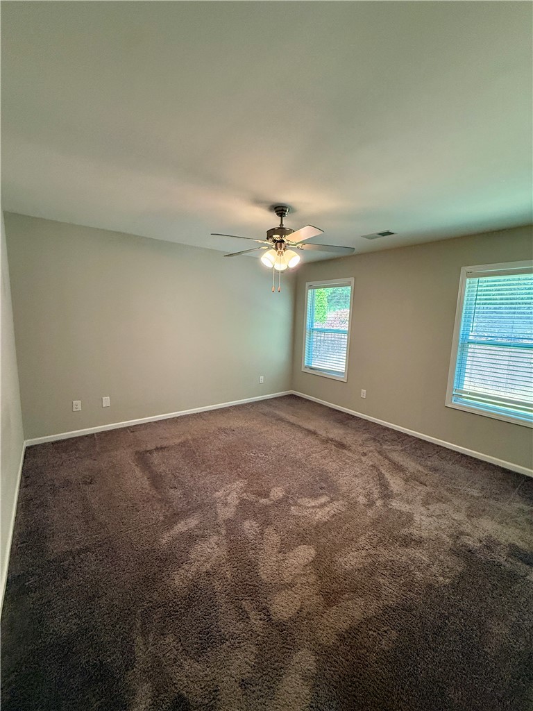 417 Laurel Grove Court Seneca, SC 29678 - Photo 8 of 10 Ample floor space and two windows characterize this inviting bedroom retreat.