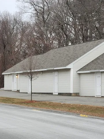 a view of a yard with trees
