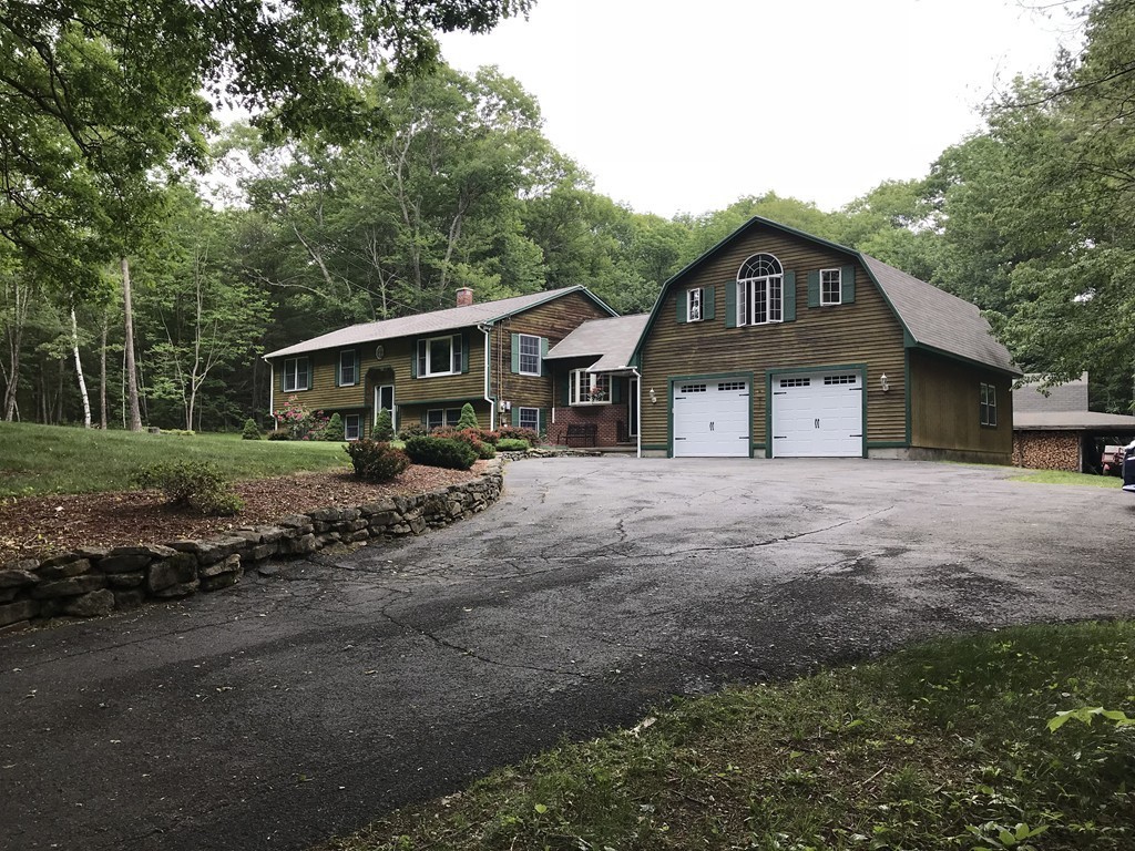 1902 New Sherborn Road Athol, MA 01331 - Photo 1 of 22 a front view of a house with a yard