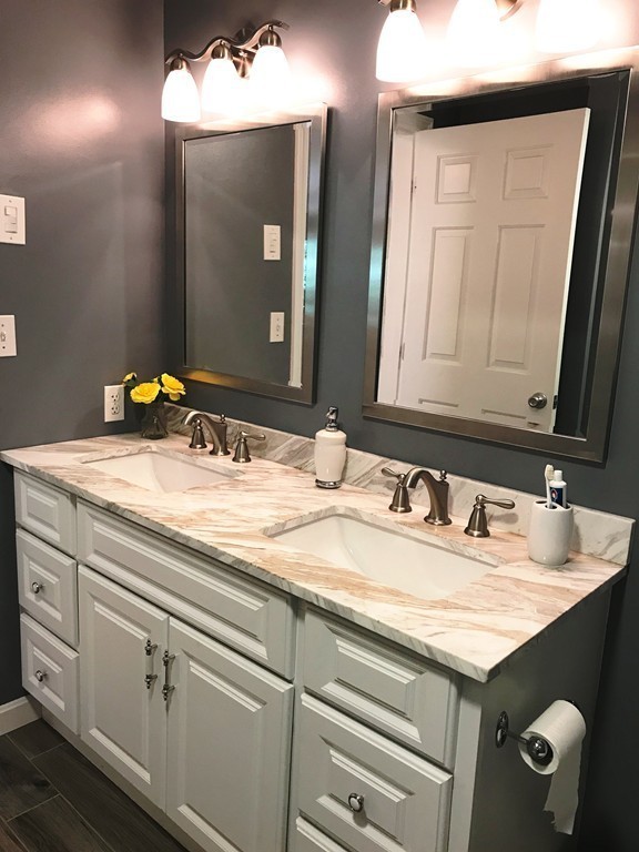 1902 New Sherborn Road Athol, MA 01331 - Photo 16 of 22 a bathroom with a sink vanity and a mirror