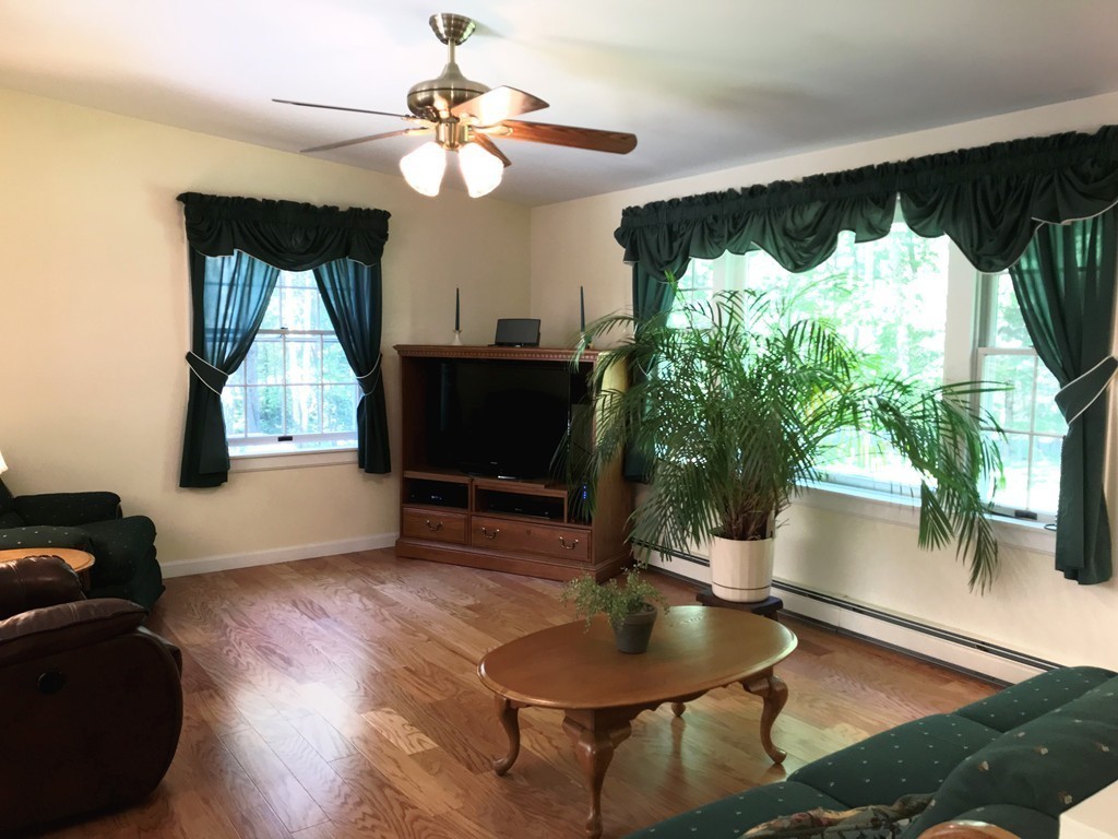 1902 New Sherborn Road Athol, MA 01331 - Photo 6 of 22 a living room with furniture and a flat screen tv