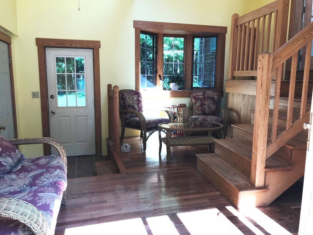 1902 New Sherborn Road Athol, MA 01331 - Photo 8 of 22 a living room with furniture fireplace and a large window