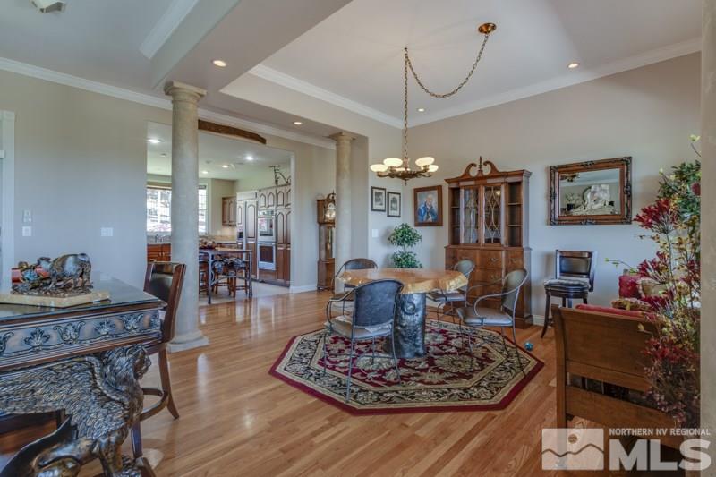 20 Hawken Road Reno, NV 89519 - Photo 14 of 26 a living room with furniture and a chandelier