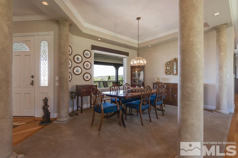 20 Hawken Road Reno, NV 89519 - Photo 6 of 26 a view of a dining room with furniture and chandelier