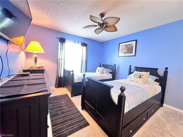 a bathroom with a sink toilet and mirror