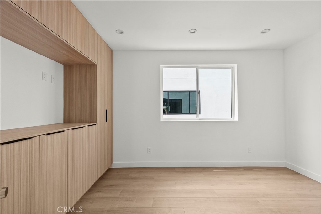 13942 Vanowen Street Van Nuys, CA 91405 - Photo 12 of 21 a view of an empty room with a window