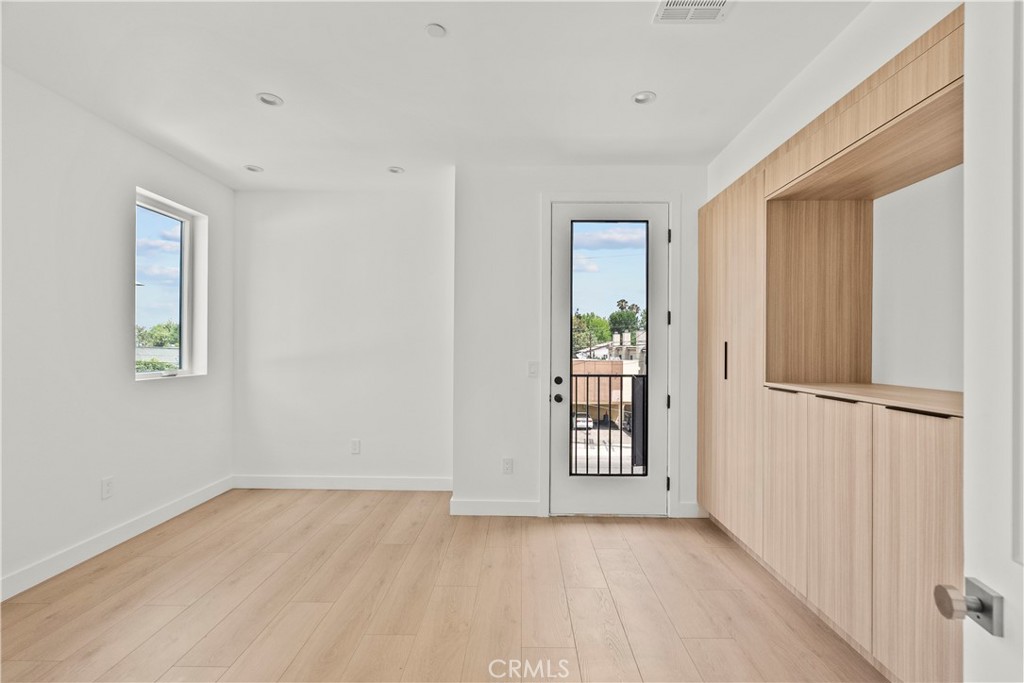 13942 Vanowen Street Van Nuys, CA 91405 - Photo 17 of 21 a view of an empty room with a window