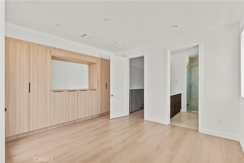 13942 Vanowen Street Van Nuys, CA 91405 - Photo 18 of 21 a view of an empty room with closet and a window