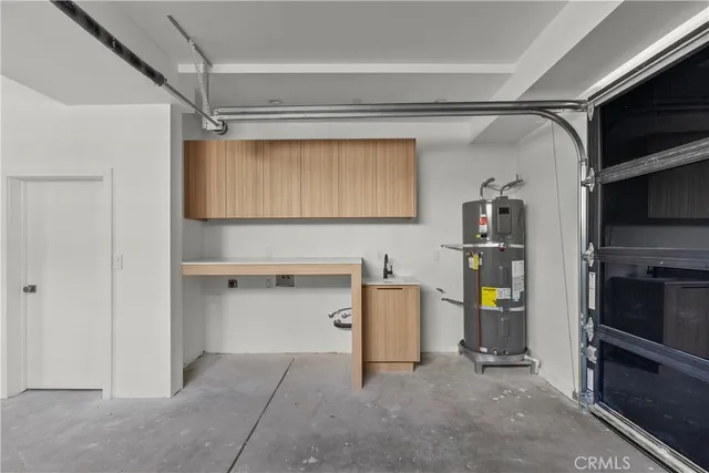 a view of kitchen and utility room