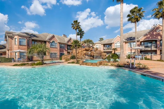 a view of a livingroom with furniture and a fireplace