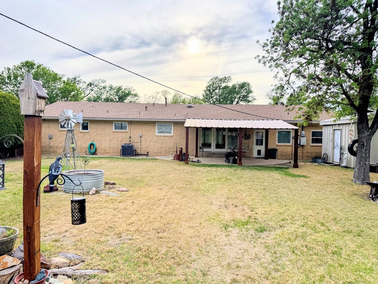 1709 South Eton Street Perryton, TX 79070 - Photo 22 of 22 a front view of a house with swimming pool