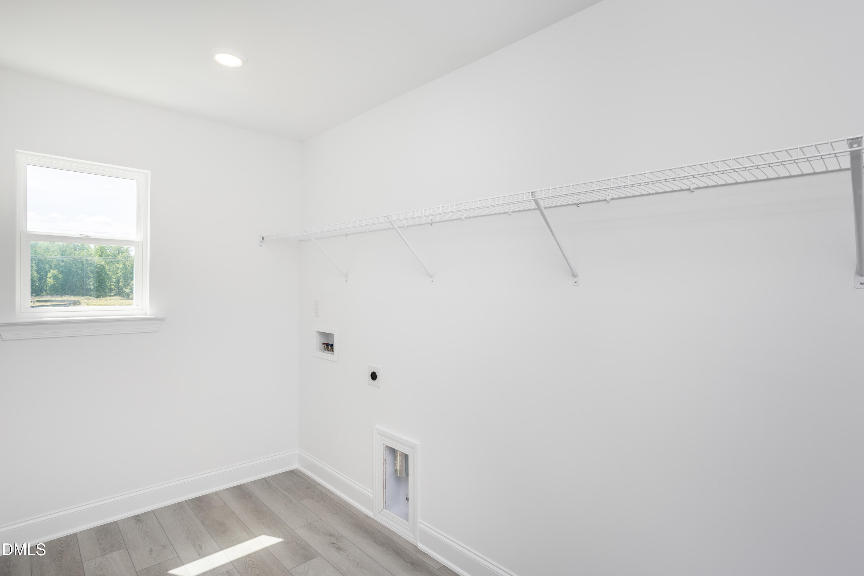 216 Cedar Rdg Trail Angier, NC 27501 - Photo 23 of 33 a view of a small space with racks on the wall