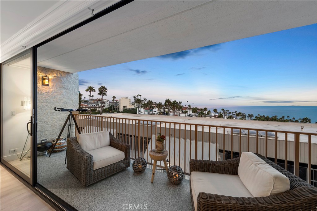 405 Avenida Granada, Unit 312 San Clemente, CA 92672 - Photo 11 of 43 a balcony with furniture and a potted plant