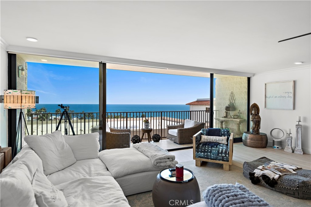 405 Avenida Granada, Unit 312 San Clemente, CA 92672 - Photo 13 of 43 a living room with furniture and a table
