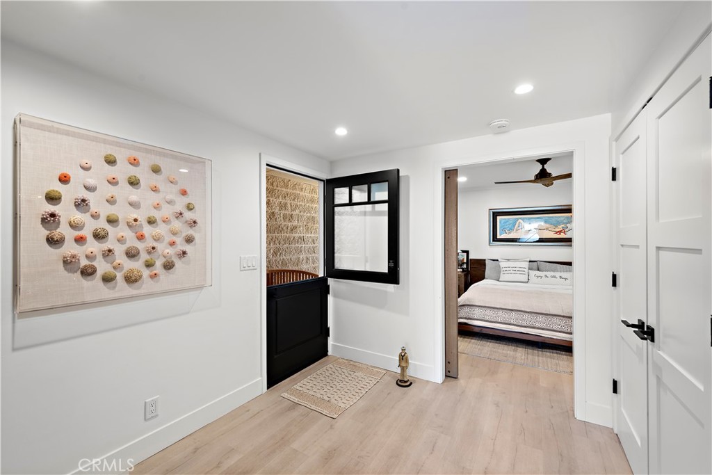 405 Avenida Granada, Unit 312 San Clemente, CA 92672 - Photo 17 of 43 a view of a bedroom with furniture and window